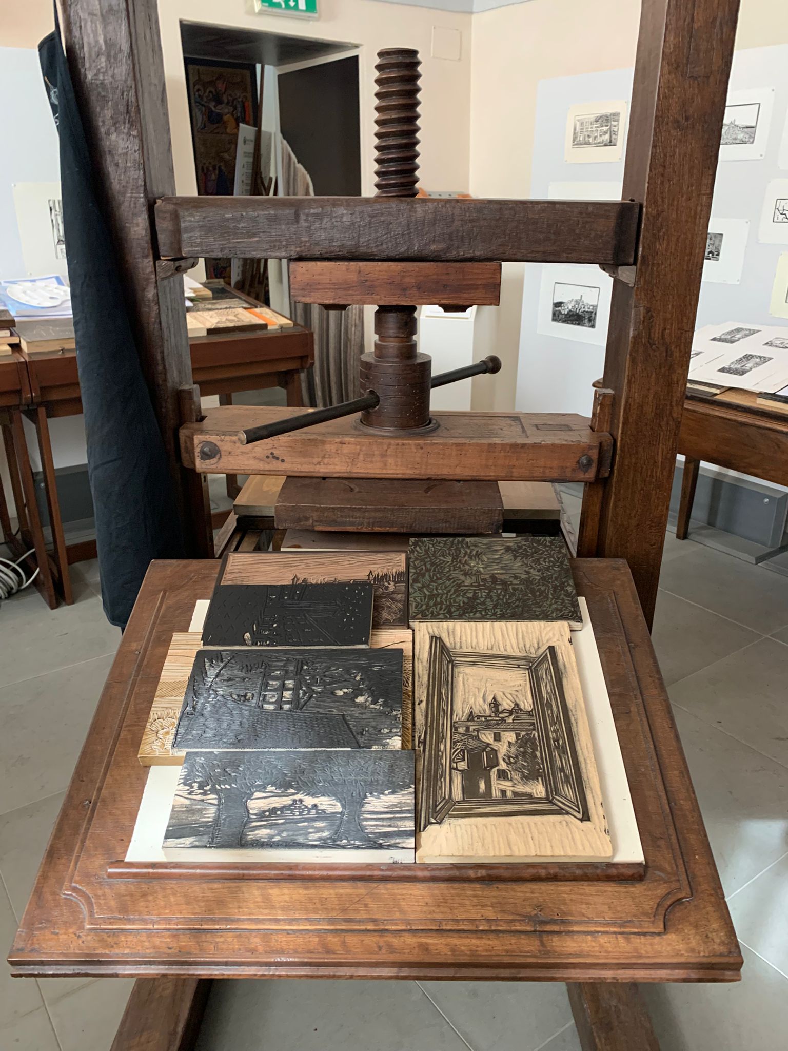 Historic manual press exhibited at the Olive Oil Civilization Museum in Trevi, Umbria
